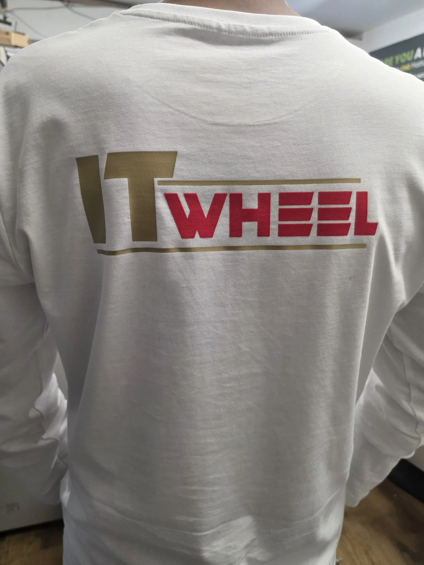 IT Wheel branded t-shirt, full back logo print — an example of our same-day London t-shirt printing